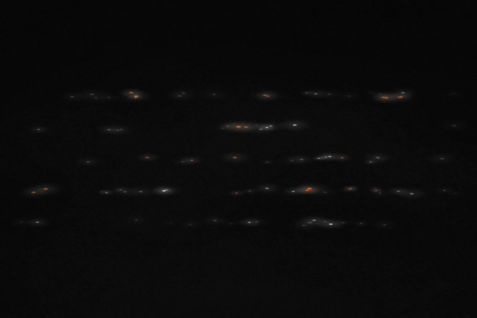 Placeholder studio image — rows of console lights glowing in a dark room.