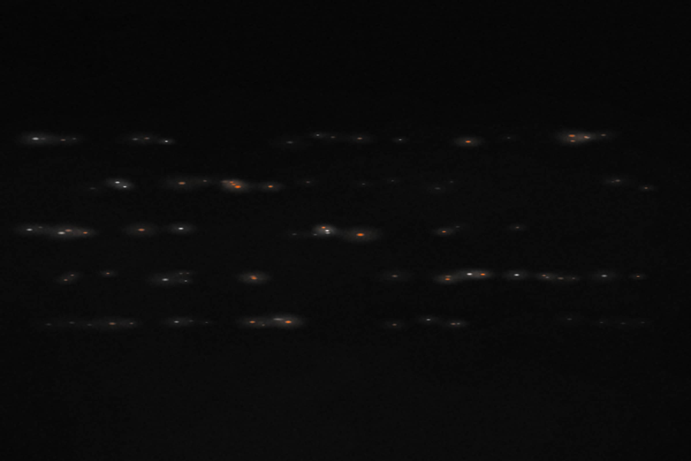 Placeholder press photo 02 — horizontal crop, console lights in a dark room.