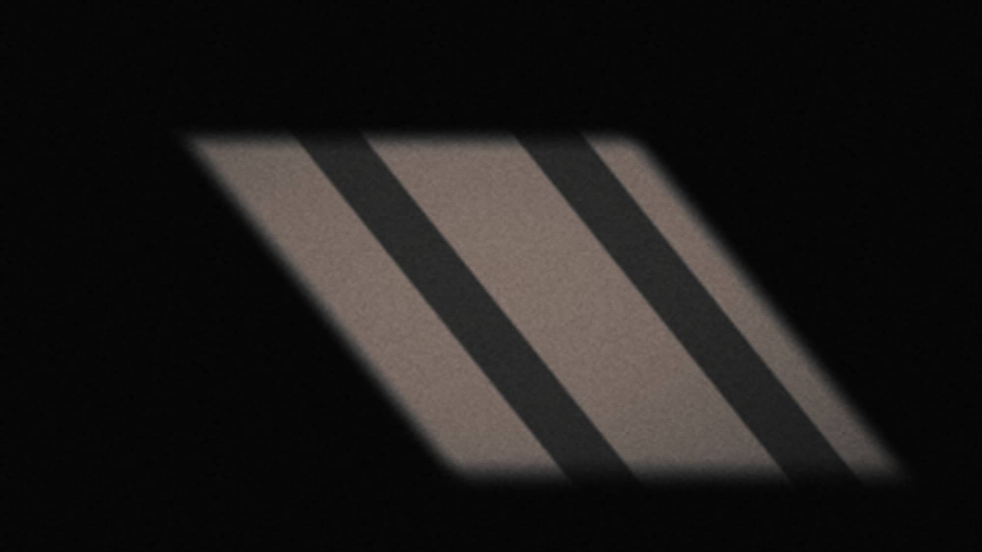 Placeholder photograph — light falling through a window across an empty room.